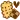 Scalloped edged biscuit cookie with a square checkerboard cookie. A floating dark brown heart is in the top right corner.