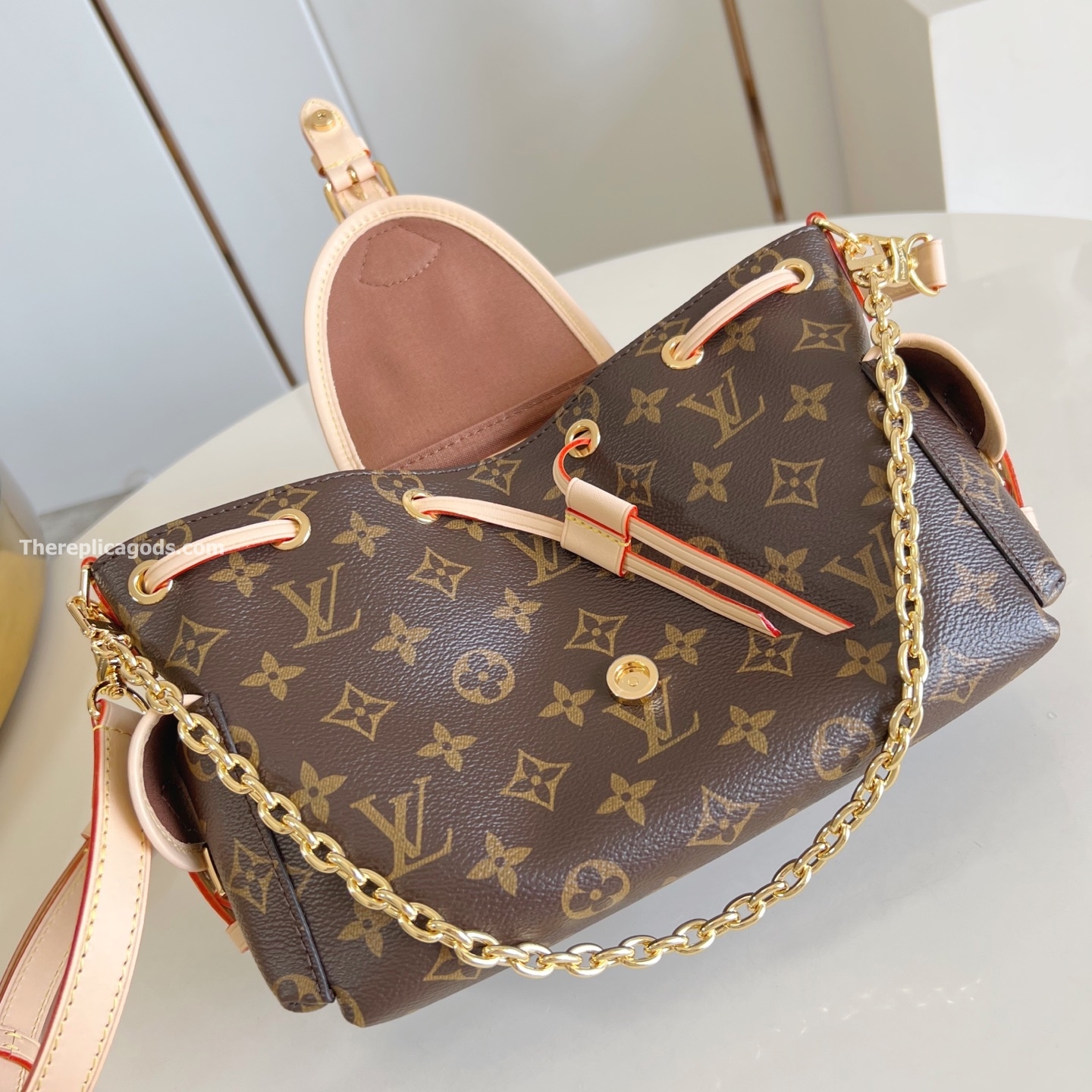 ODYSSEE HANBAG BROWN MONOGRAM CANVAS M25085