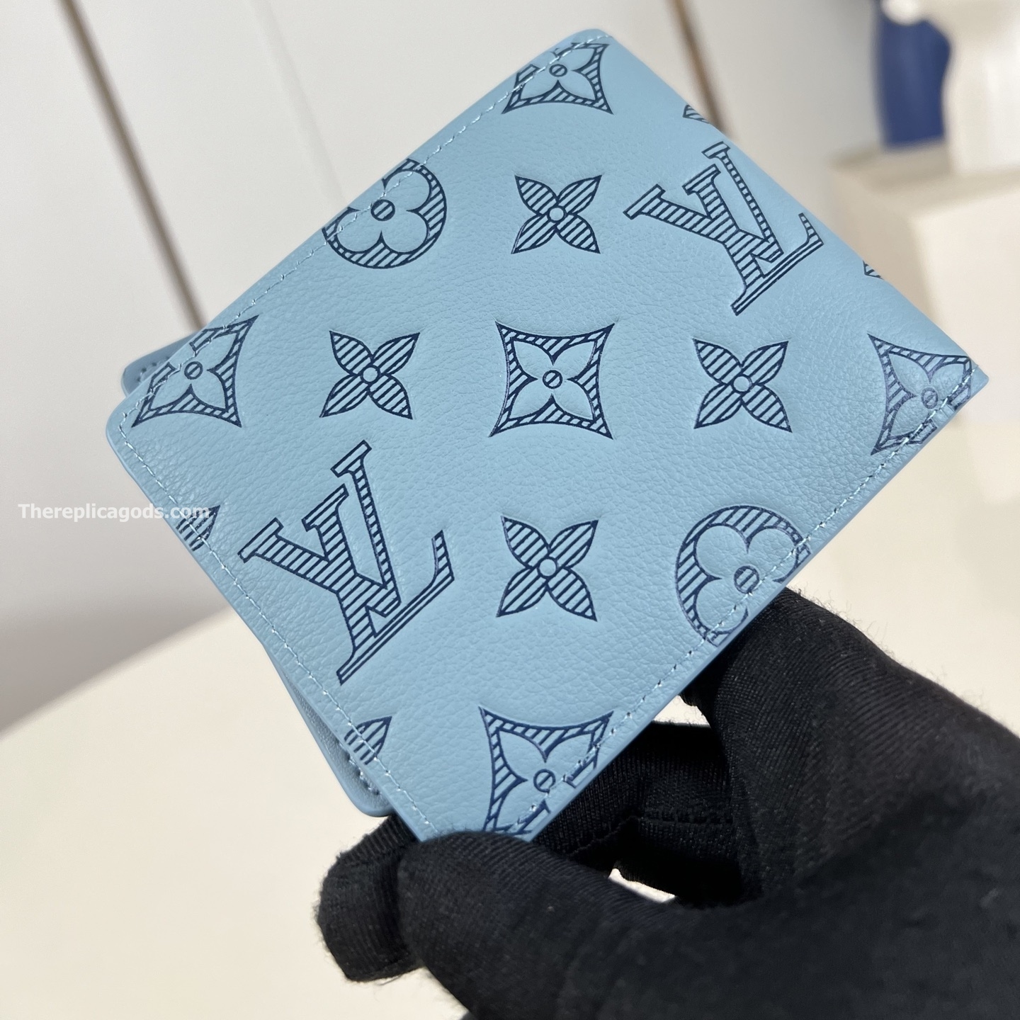 MULTIPLE WALLET SKY BLUE MONOGRAM SHADOW CALF LEATHER M14802
