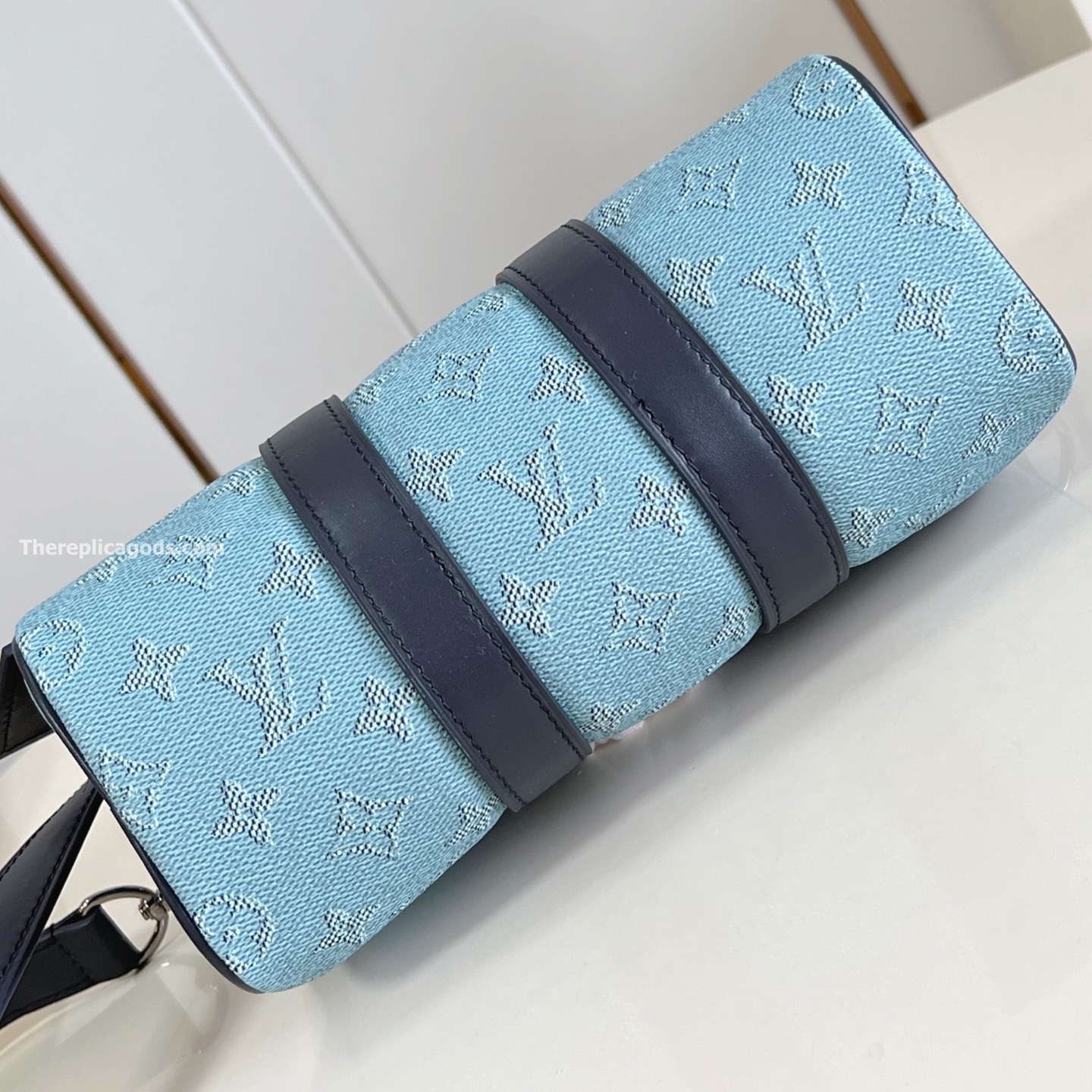 KEEPALL BANDOULIERE 25 BLUE MONOGRAM HERITAGE CANVAS M14681