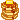 A stack of pixel art pancakes with syrup and butter that shifts back and forth.