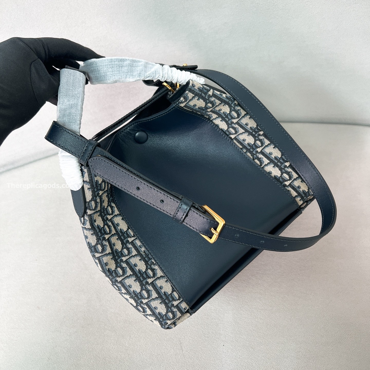 SMALL SIGNATURE BUCKET BAG BLUE OBLIQUE JACQUARD AND SMOOTH CALFSKIN