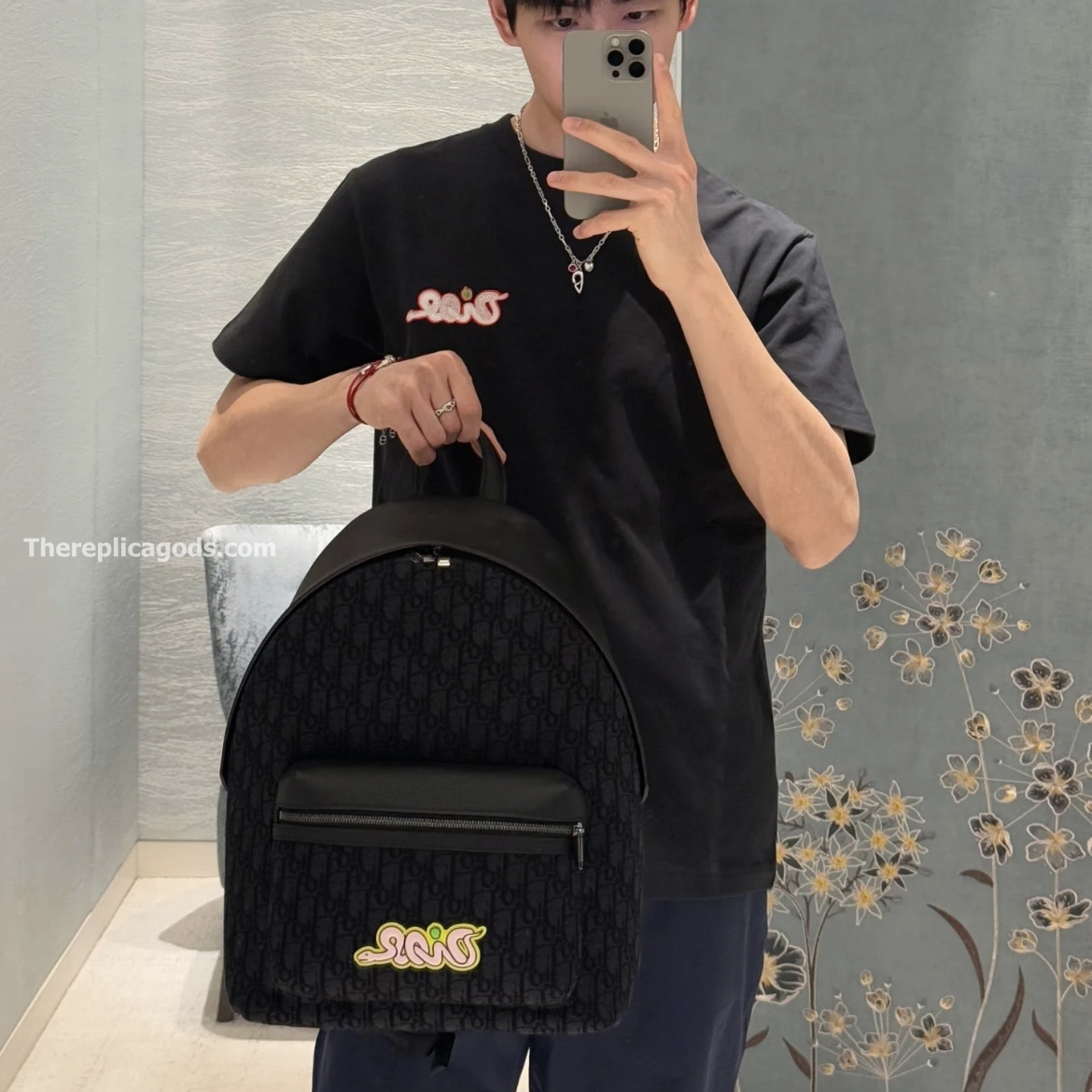 AND KAWS RIDER 2.0 ZIPPED BACKPACK BLACK GRAINED CALFSKIN AND OBLIQUE JACQUARD