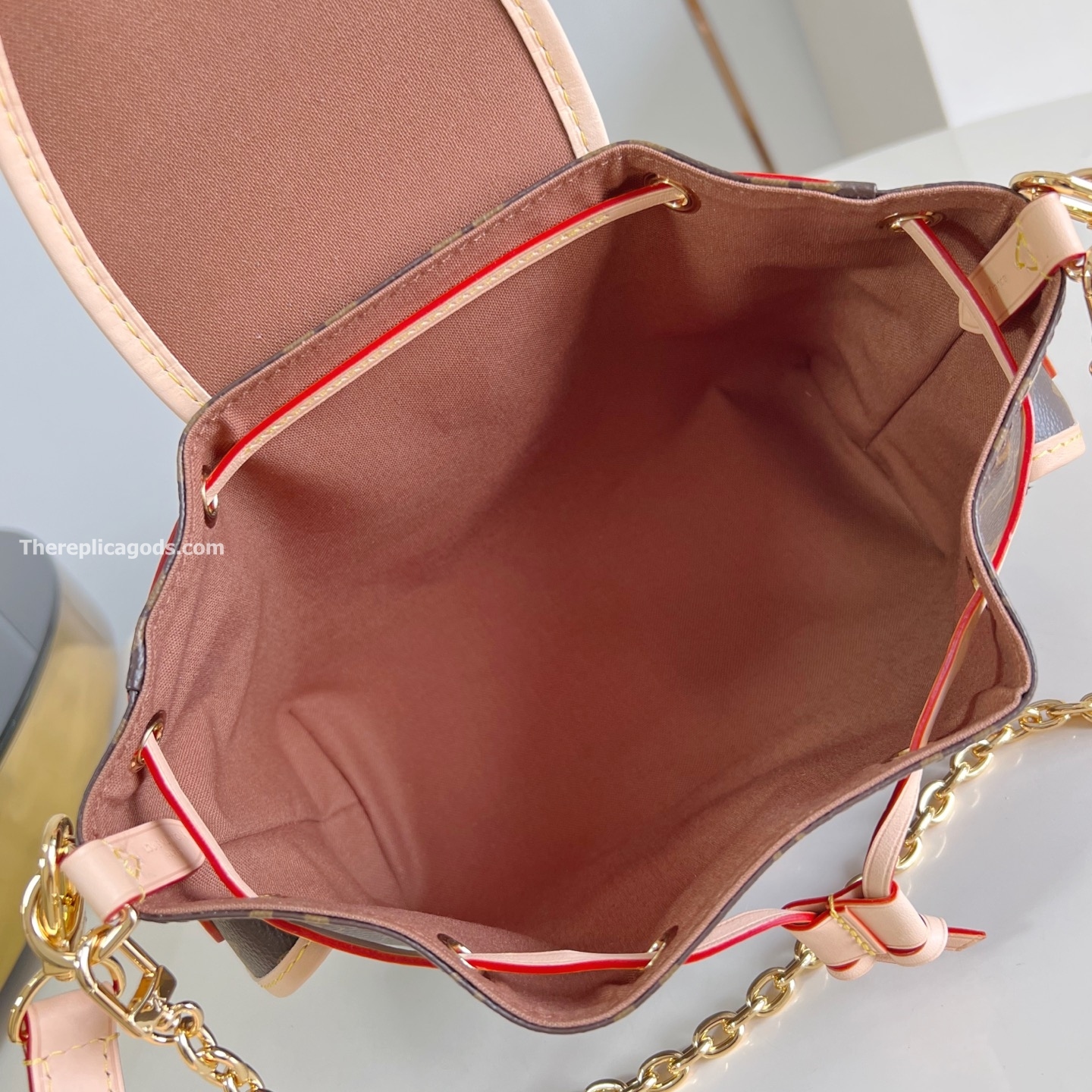ODYSSEE HANDBAG BROWN MONOGRAM CANVAS M25085