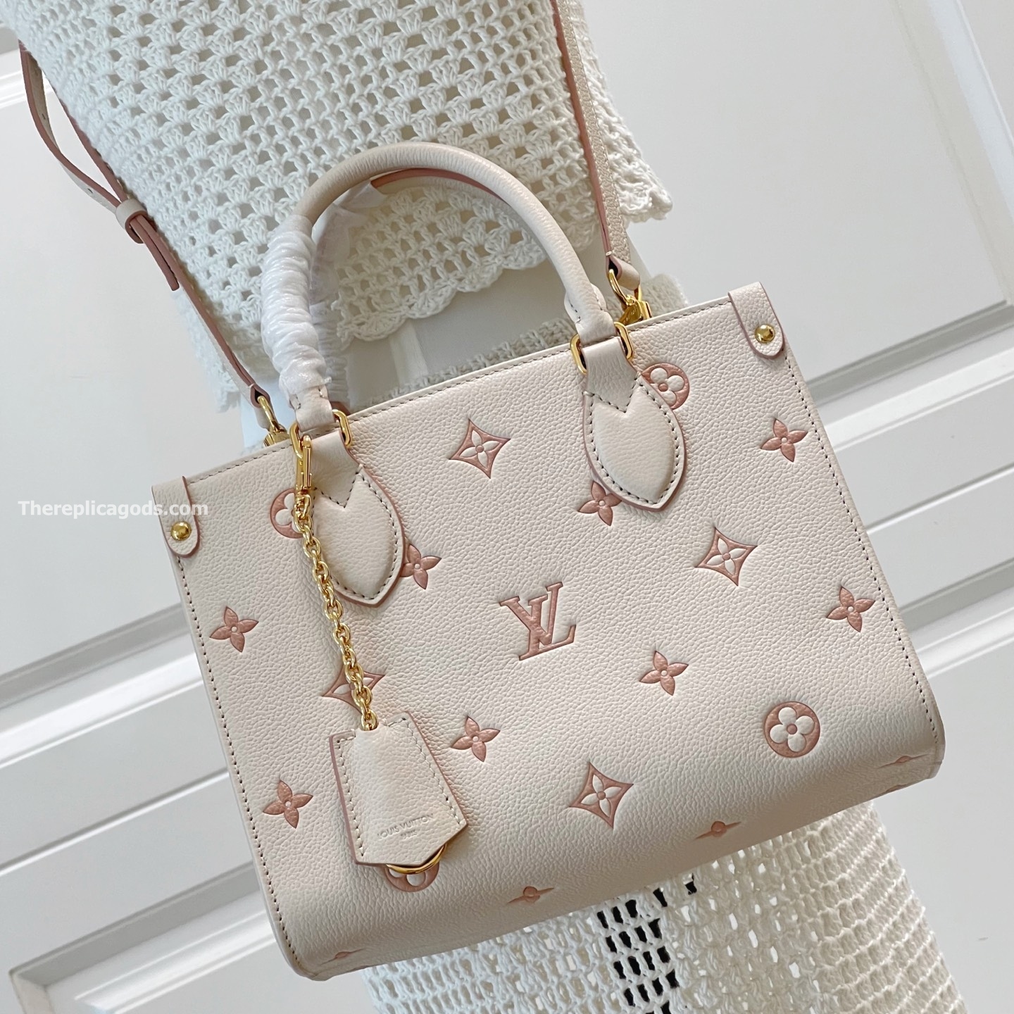 ONTHEGO PM BAG EDEN MONOGRAM EMPREINTE LEATHER M14403