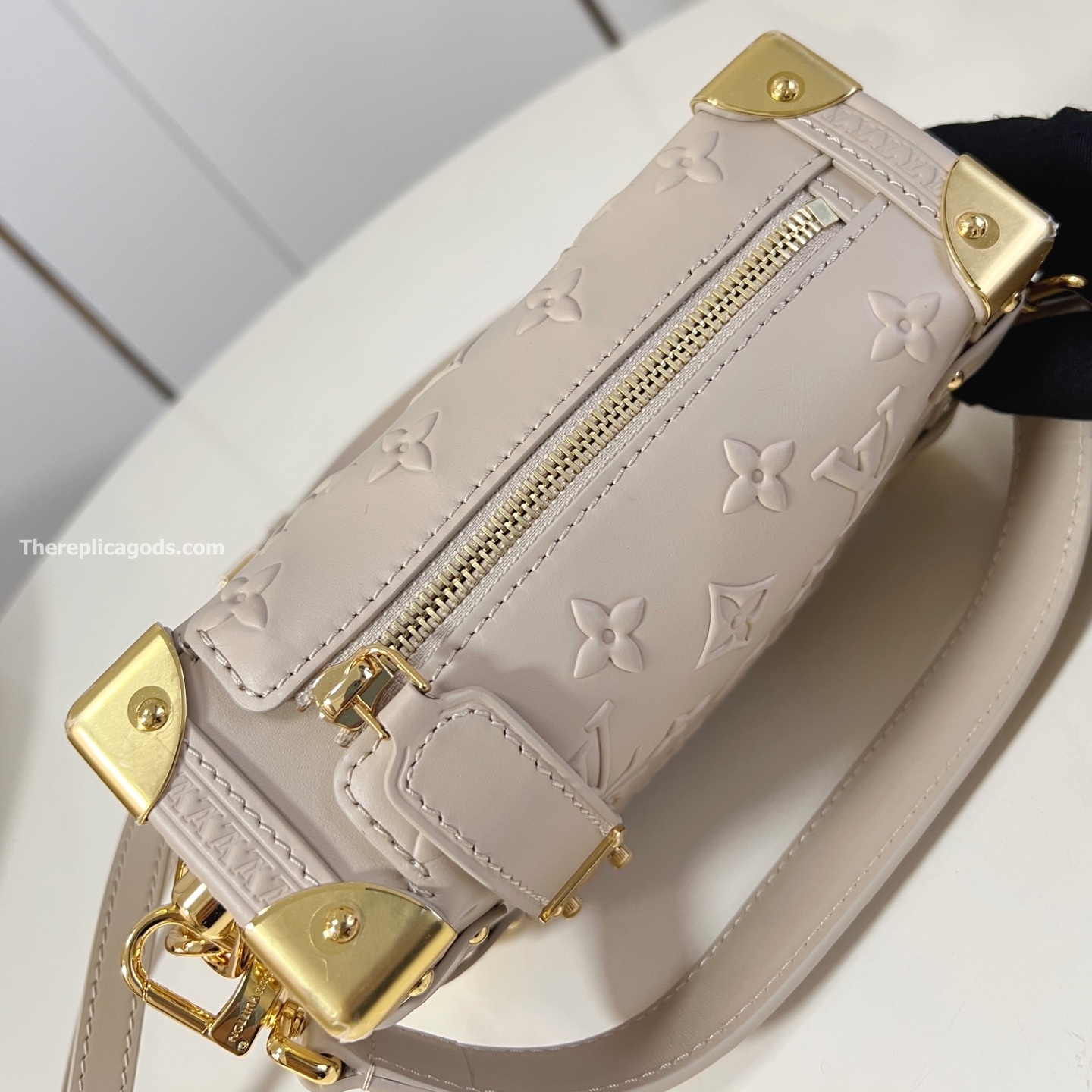 SIDE TRUNK PM BAG BISCUIT CALF LEATHER M14571