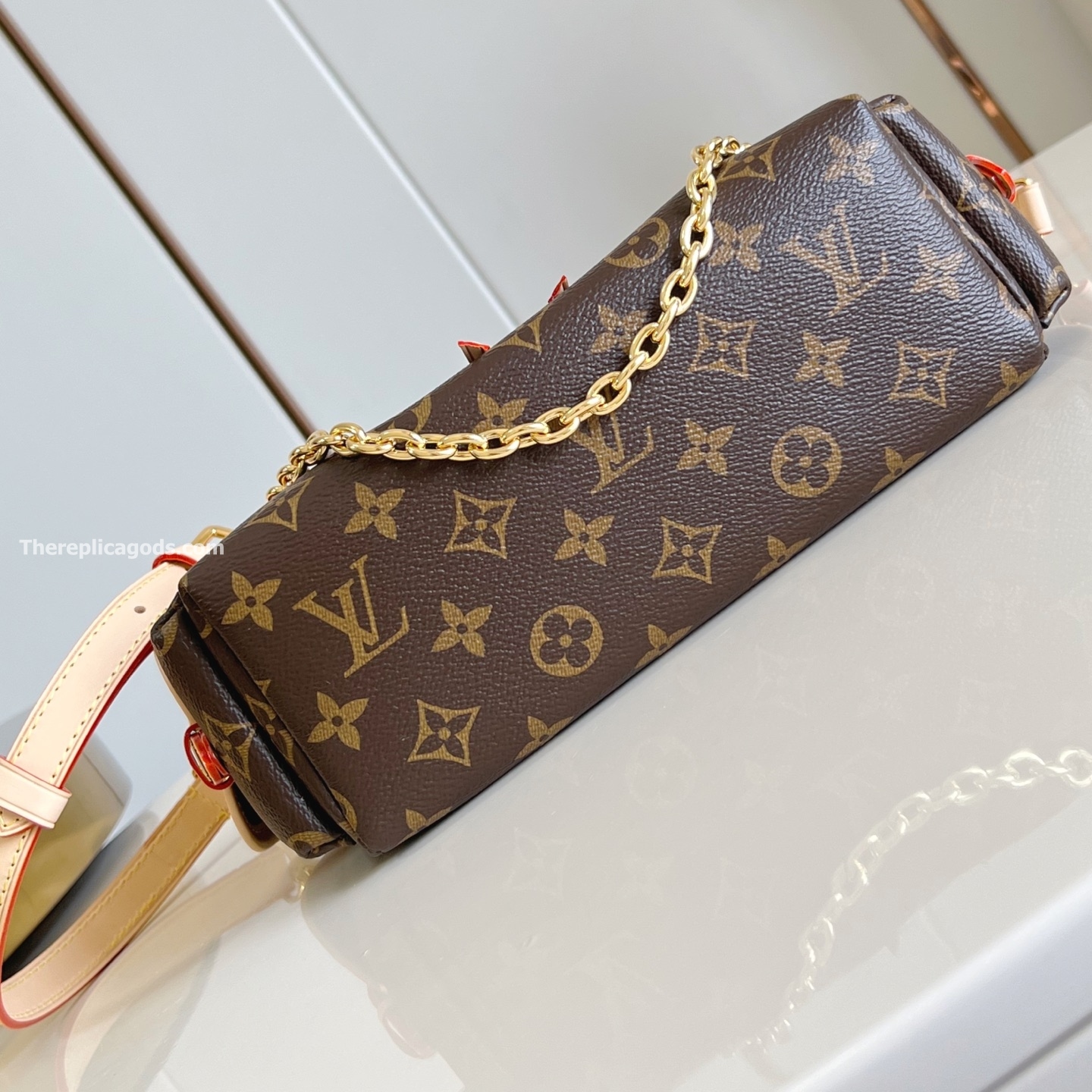 ODYSSEE HANBAG BROWN MONOGRAM CANVAS M25085