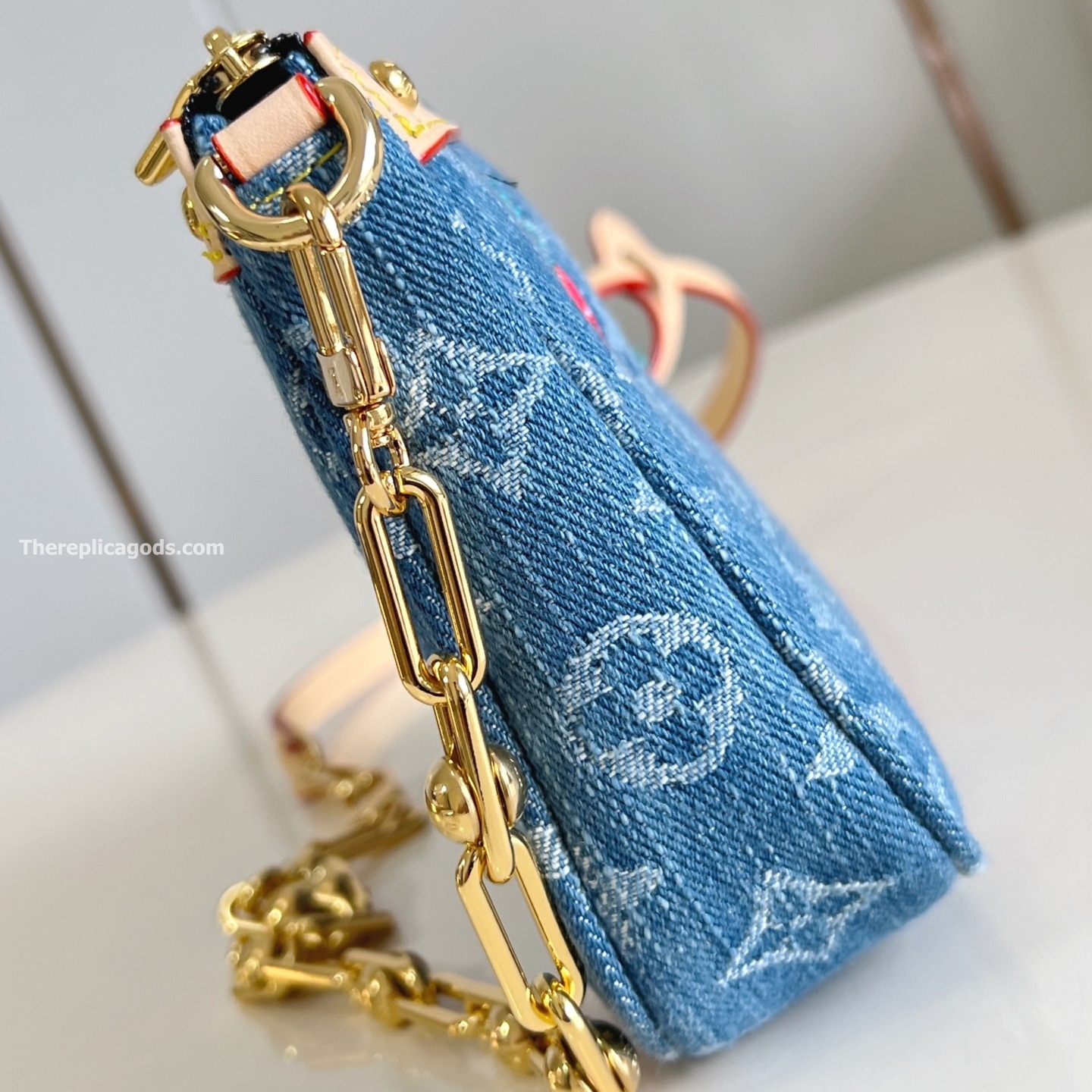 X TM POCHETTE ACCESSOIRES MONOGRAM CHERRY DENIM M13994