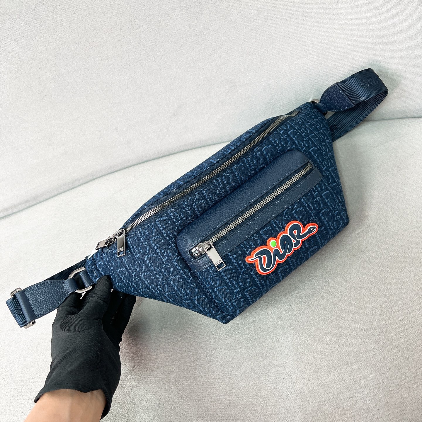 AND KAWS RIDER 2.0 BELT BAG NAVY BLUE OBLIQUE JACQUARD AND GRAINED CALFSKIN