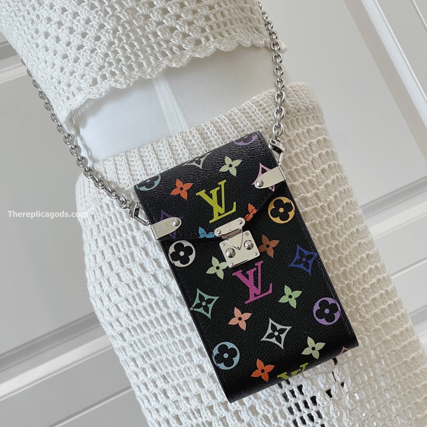 x TM PHONE POUCH METIS MULTICOLORED M14098