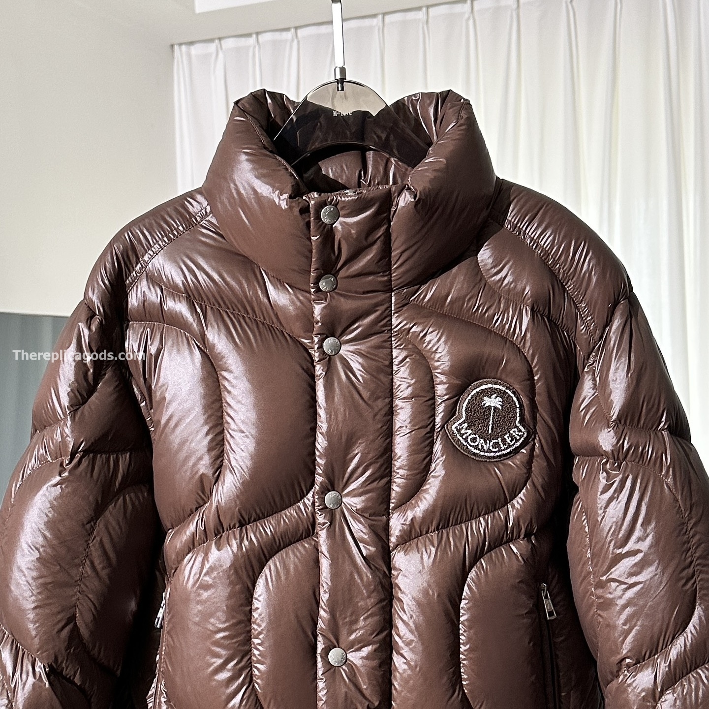 X PALM ANGELS HAUNANI NYLON DOWN JACKET IN BROWN