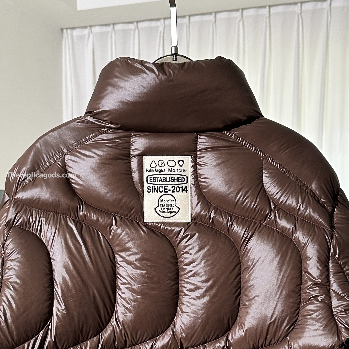 X PALM ANGELS HAUNANI NYLON DOWN JACKET IN BROWN
