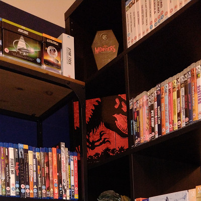 Image For Post | Awkwardly sized box sets on an awkward to access shelf