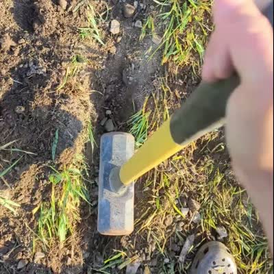 Image For Post | As I filled in the rest of the dirt, I tamped with a 20lb sledgehammer. If you don't tamp down the dirt, the soil will slowly sink as it compacts itself over the next few months, leaving you with a permanent rut which is no fun for a mower.