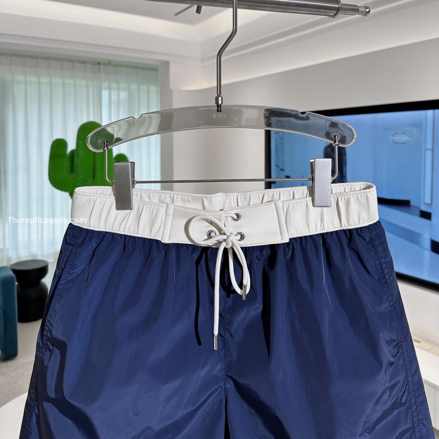 LOGO PATCH SWIM SHORTS IN BLUE - TP628