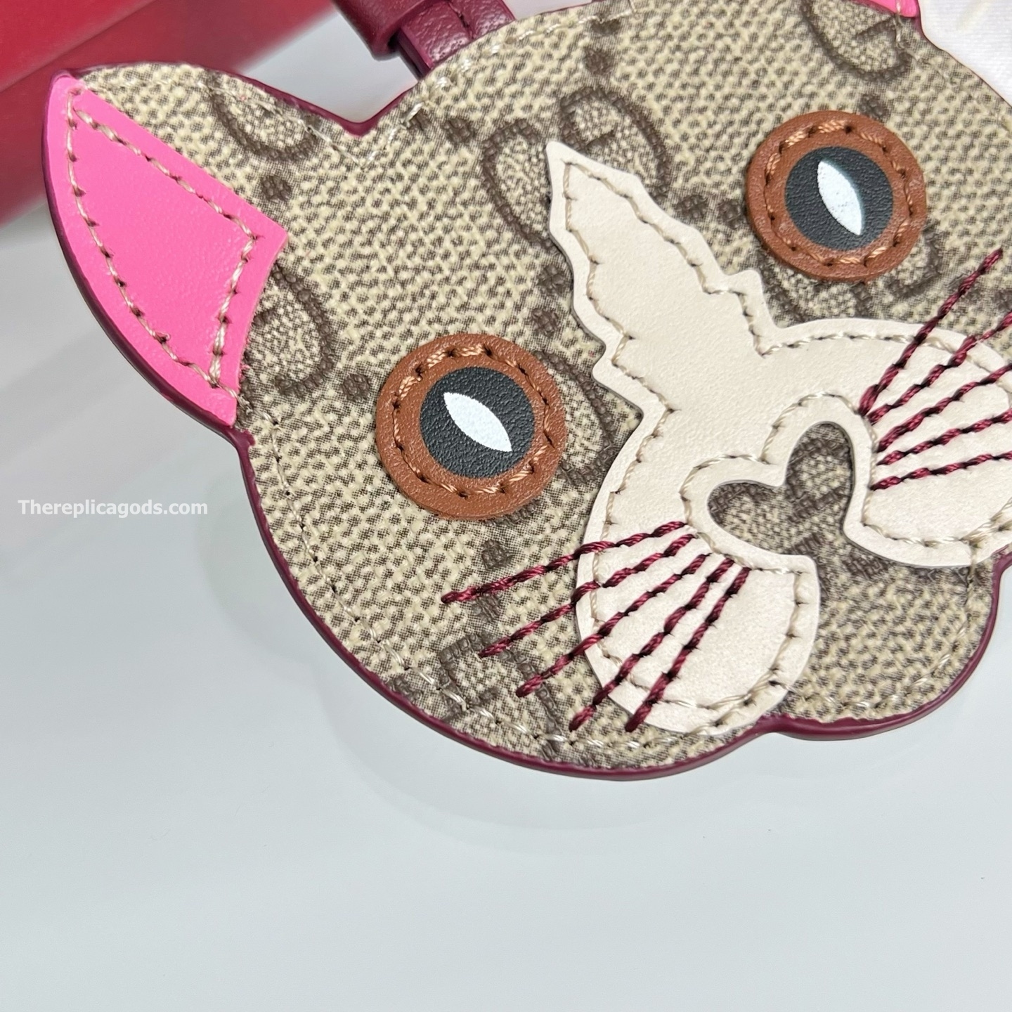 CAT-SHAPED BAG CHARM BEIGE AND DARK BROWN NEW GG MONOGRAM CANVAS