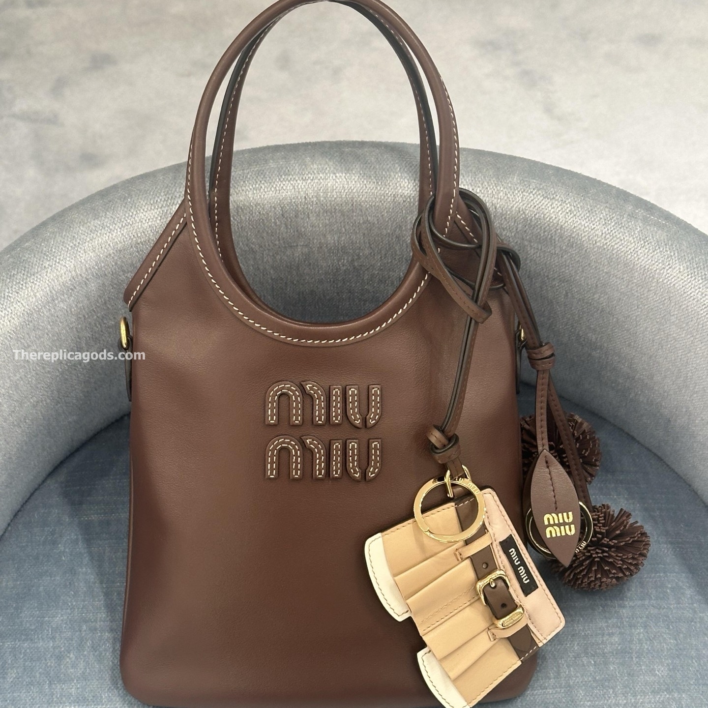 LEATHER KEYCHAIN TRICK IN BEIGE