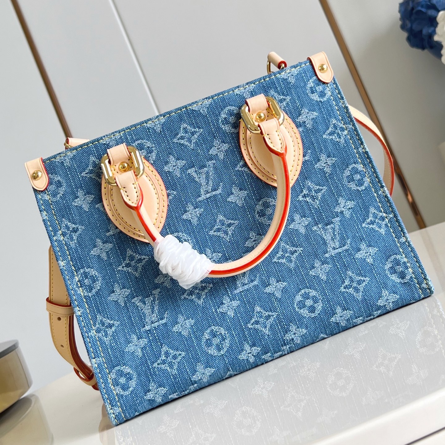 ONTHEGO PM BAG IN DENIM BLUE M14633