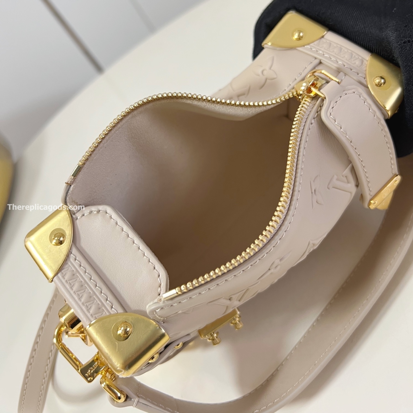 SIDE TRUNK PM BAG BISCUIT CALF LEATHER M14571