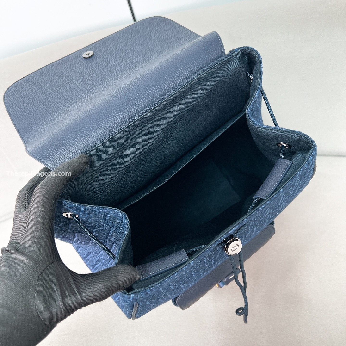 SADDLE BACKPACK WITH FLAP NAVY BLUE GRAINED CALFSKIN