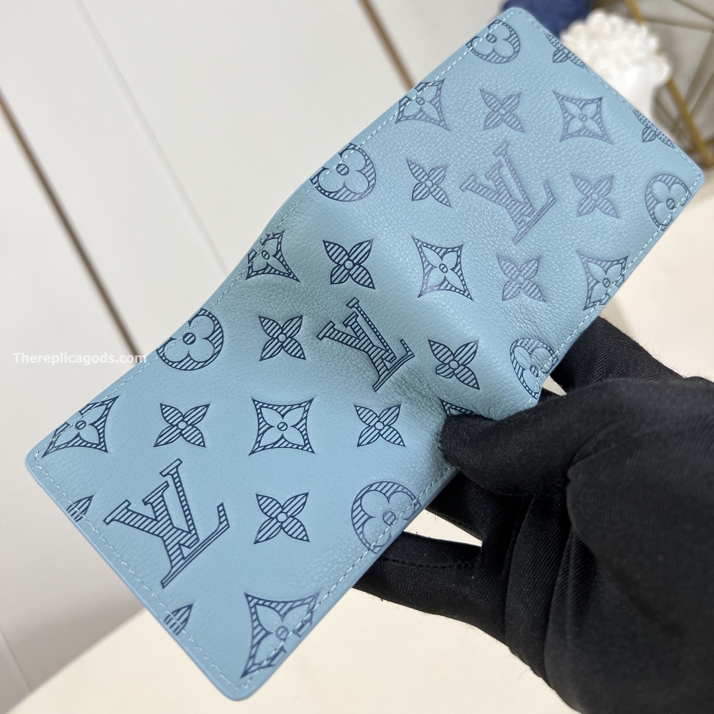 MULTIPLE WALLET SKY BLUE MONOGRAM SHADOW CALF LEATHER M14802
