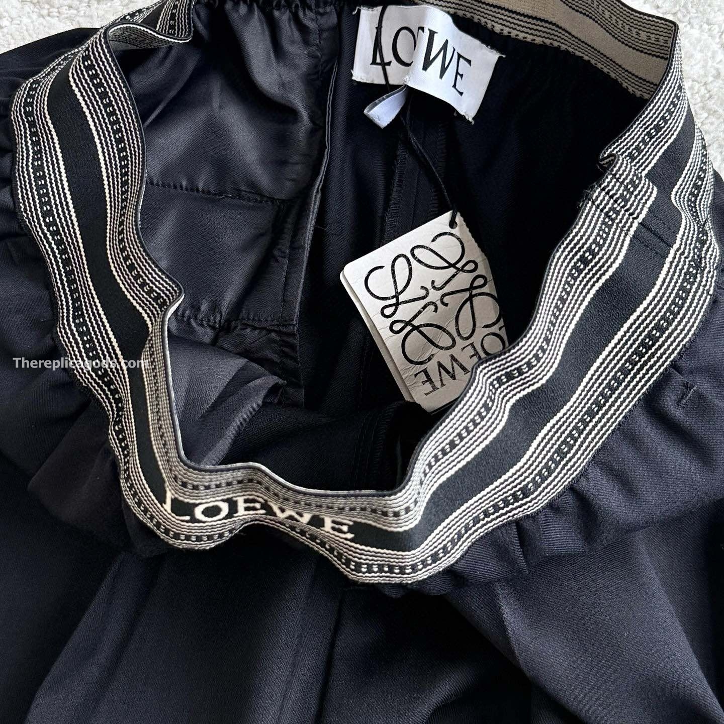 LOGO BANDED CROPPED TROUSERS IN BLACK - TP568