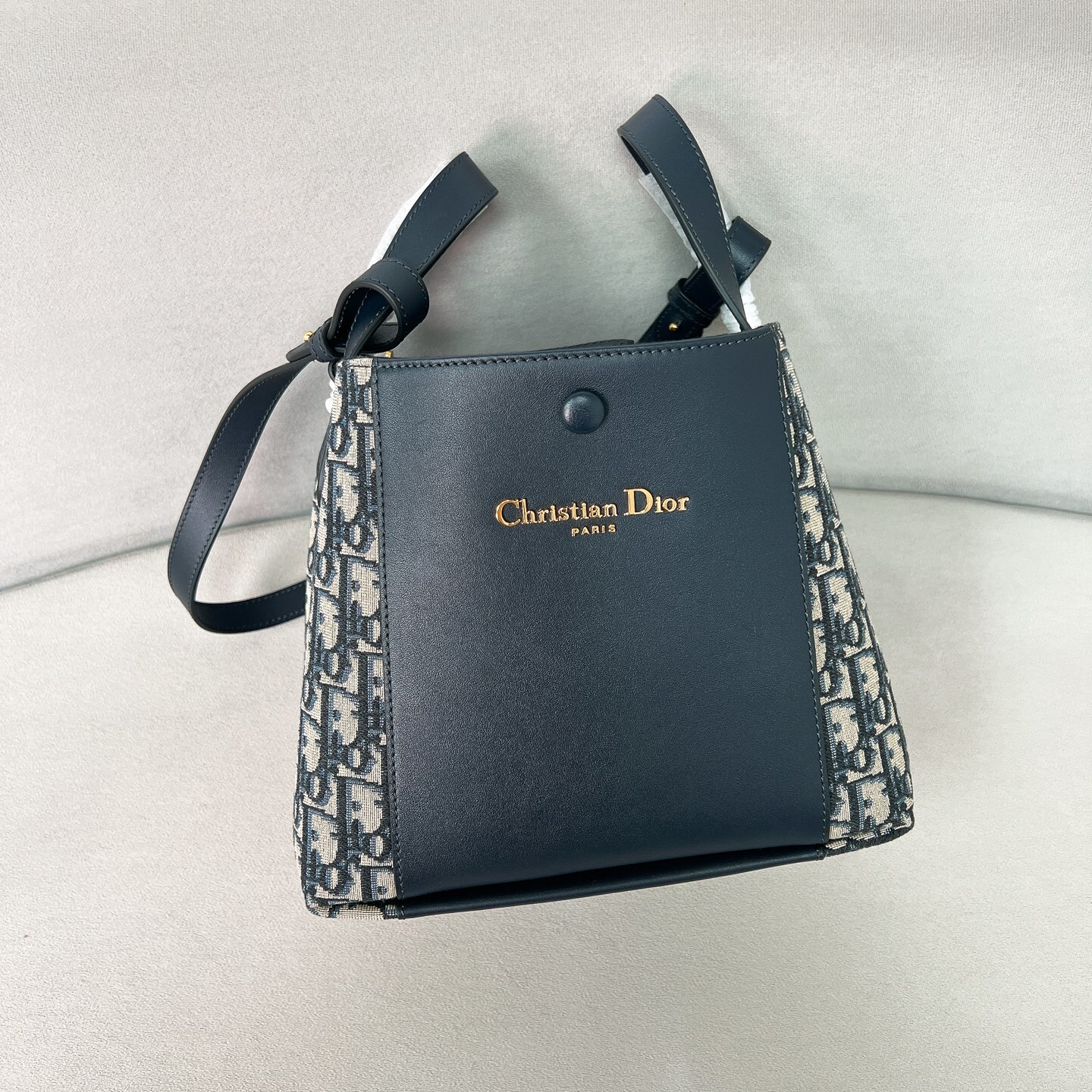 SMALL SIGNATURE BUCKET BAG BLUE OBLIQUE JACQUARD AND SMOOTH CALFSKIN