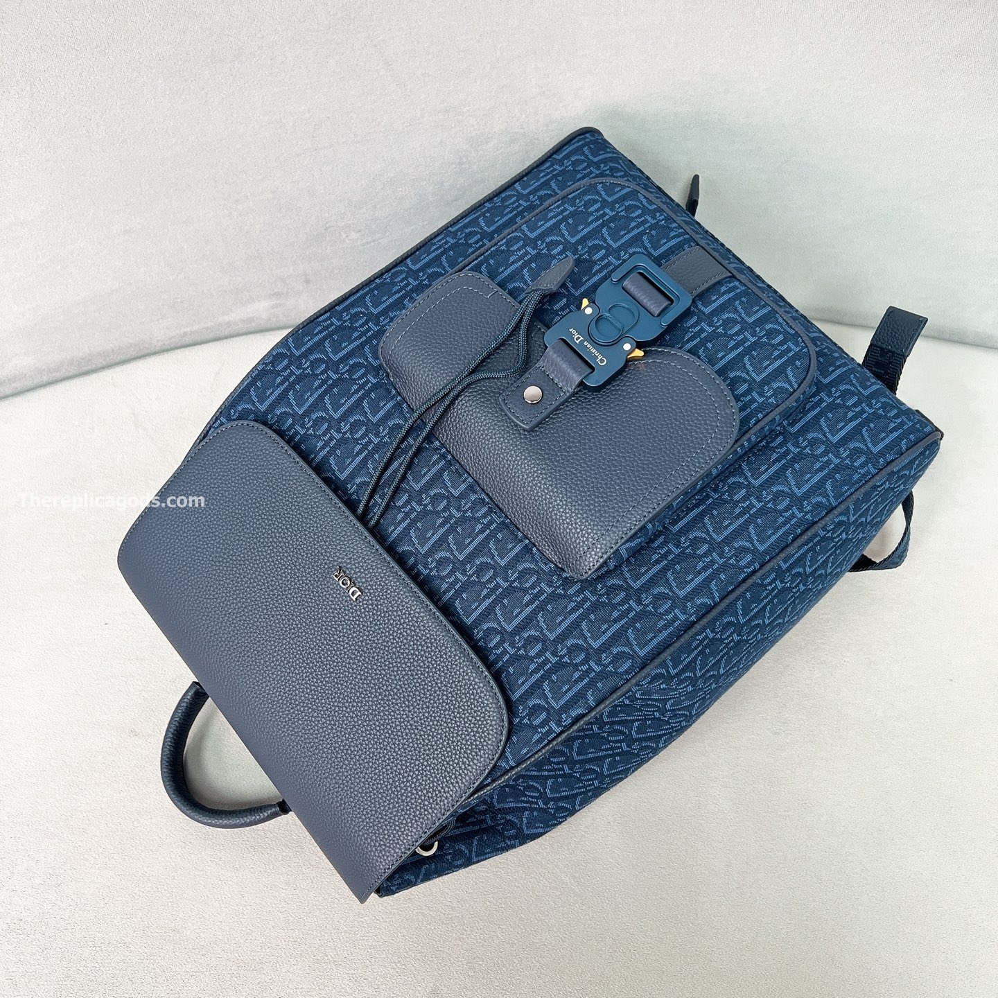 SADDLE BACKPACK WITH FLAP NAVY BLUE GRAINED CALFSKIN