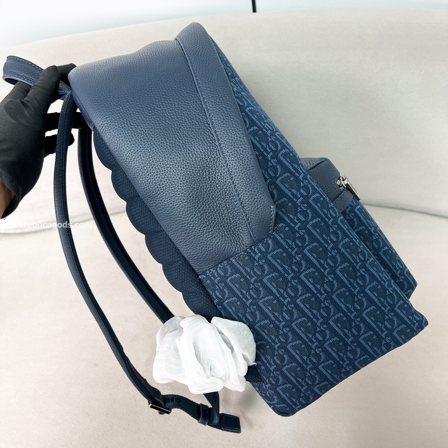 AND KAWS RIDER 2.0 ZIPPED BACKPACK NAVY BLUE GRAINED CALFSKIN AND OBLIQUE JACQUARD
