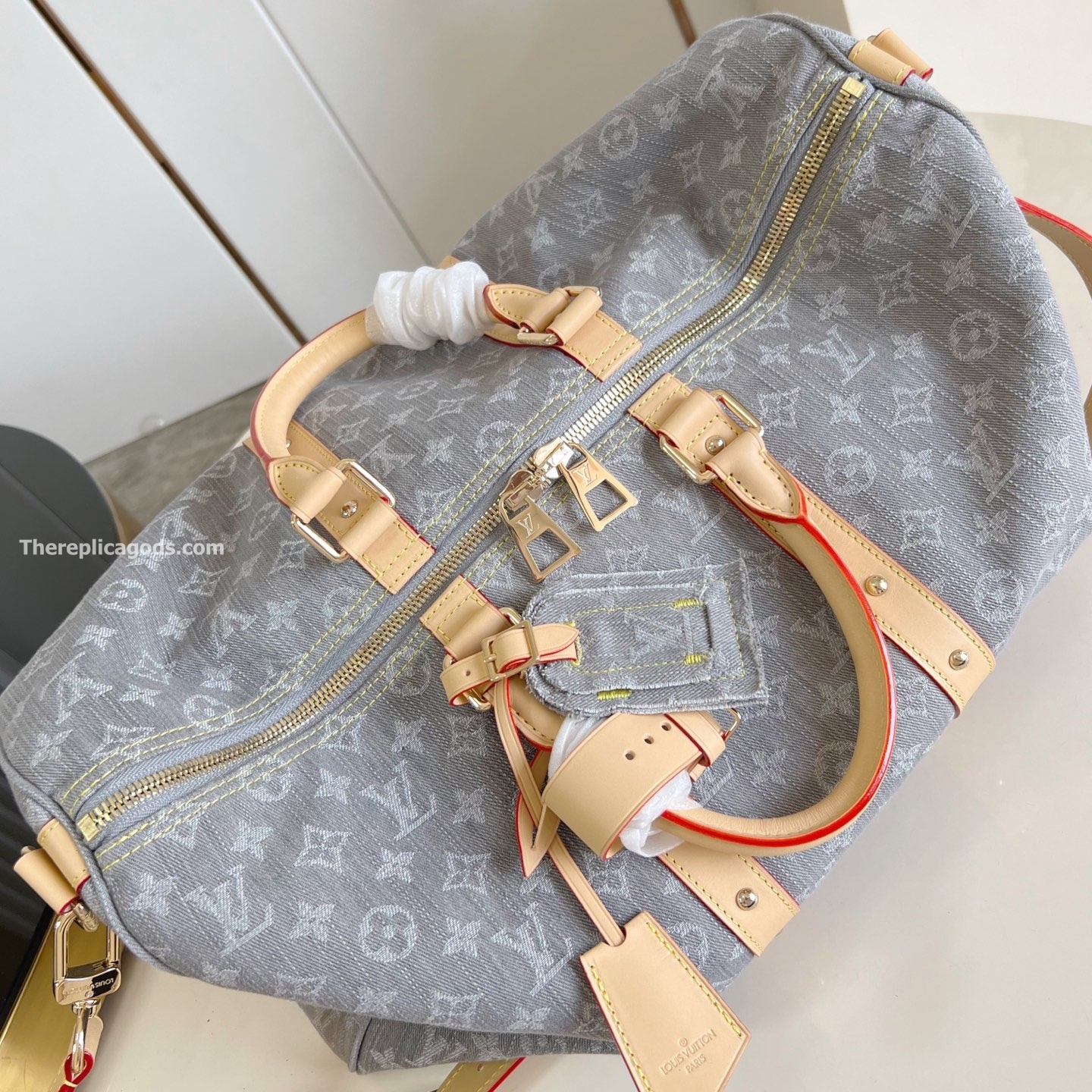 KEEPALL BANDOULIERE 45 BAG CLOUDY GRAY MONOGRAM DENIM M13748