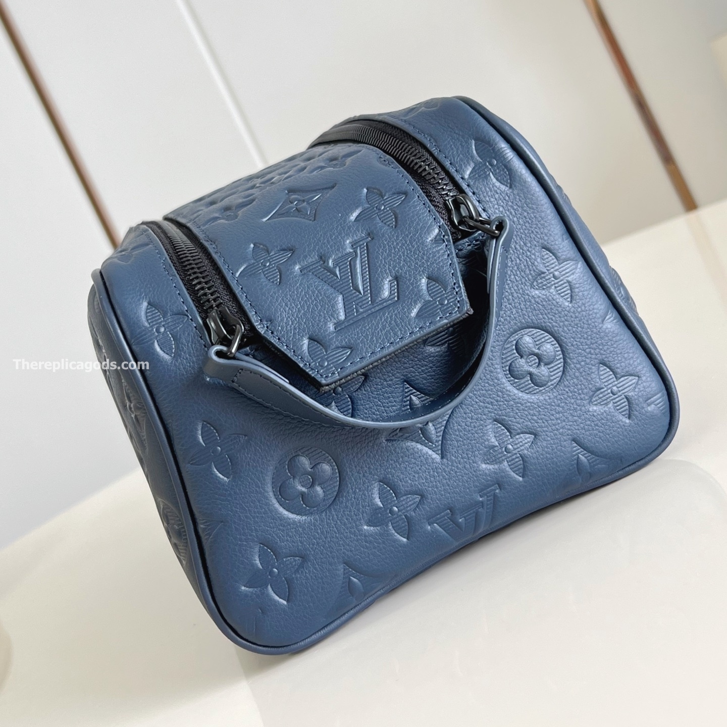 DOPP KIT NAVY BLUE MONOGRAM SHADOW M14843