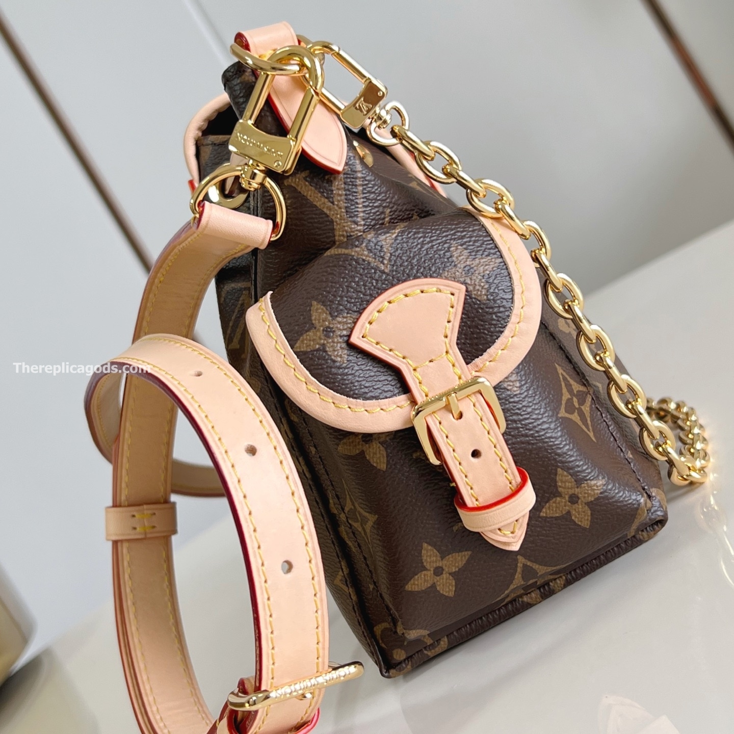ODYSSEE HANDBAG BROWN MONOGRAM CANVAS M25085