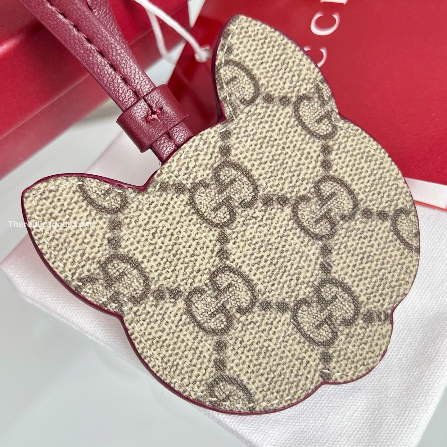 CAT-SHAPED BAG CHARM BEIGE AND DARK BROWN NEW GG MONOGRAM CANVAS