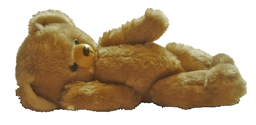 A large image of a brown teddy bear laying on its side.