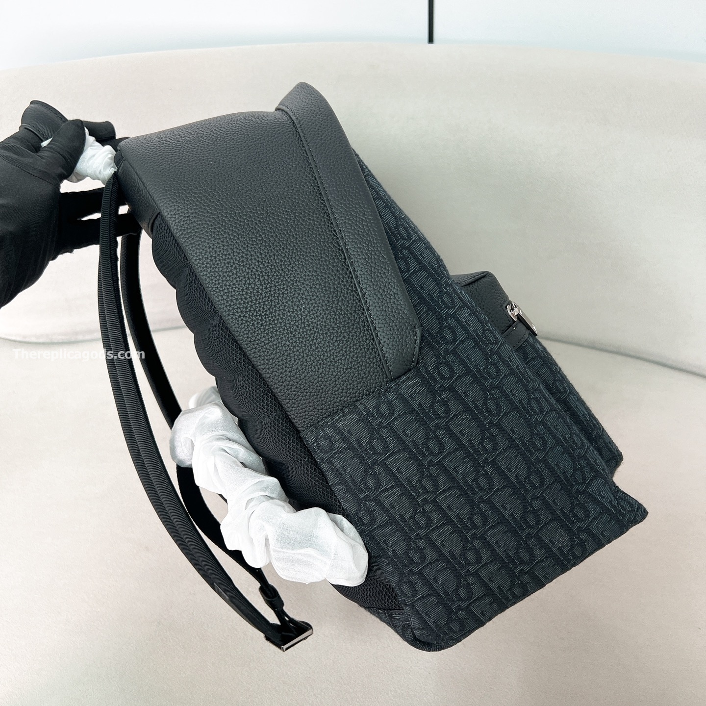 AND KAWS RIDER 2.0 ZIPPED BACKPACK BLACK GRAINED CALFSKIN AND OBLIQUE JACQUARD