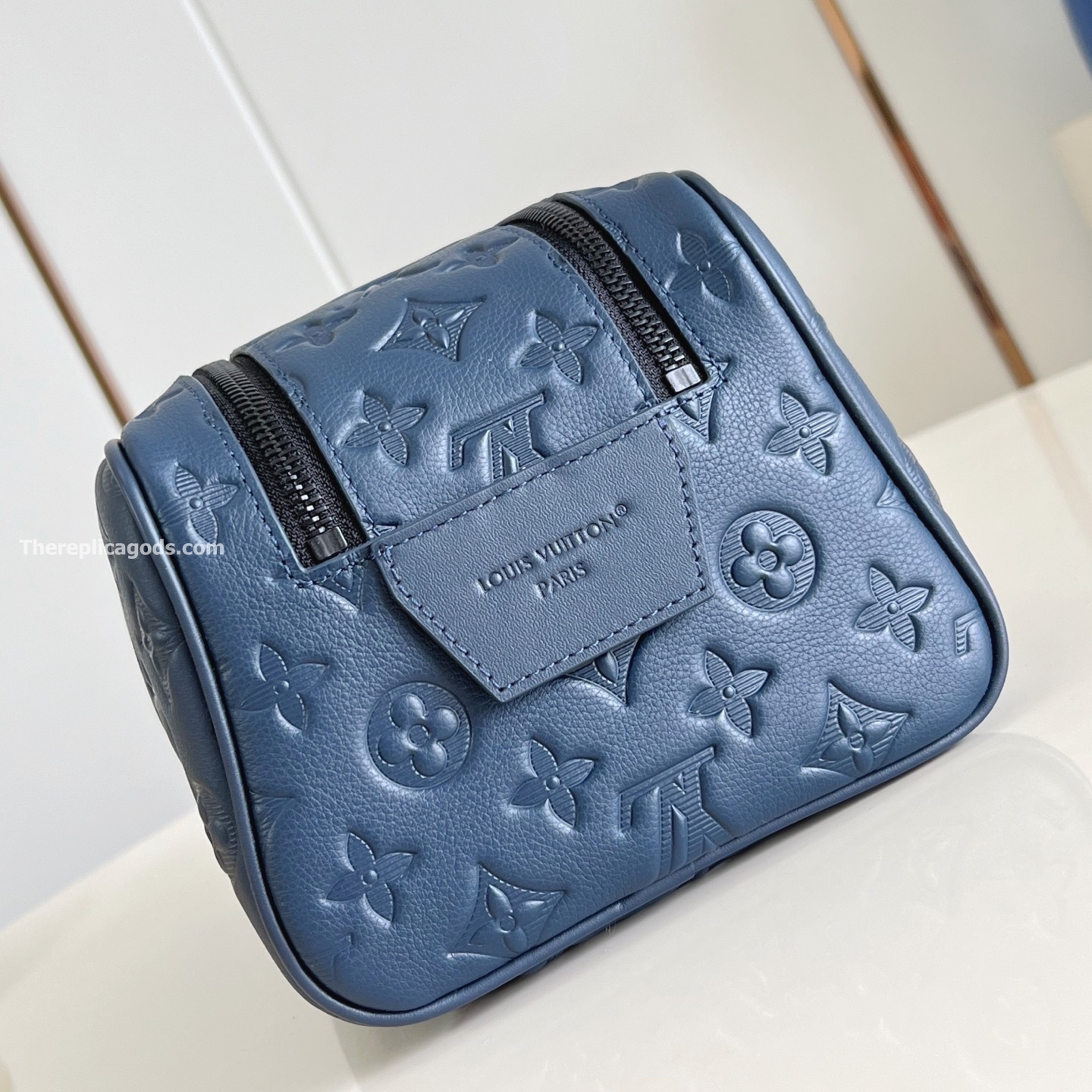 DOPP KIT NAVY BLUE MONOGRAM SHADOW M14843