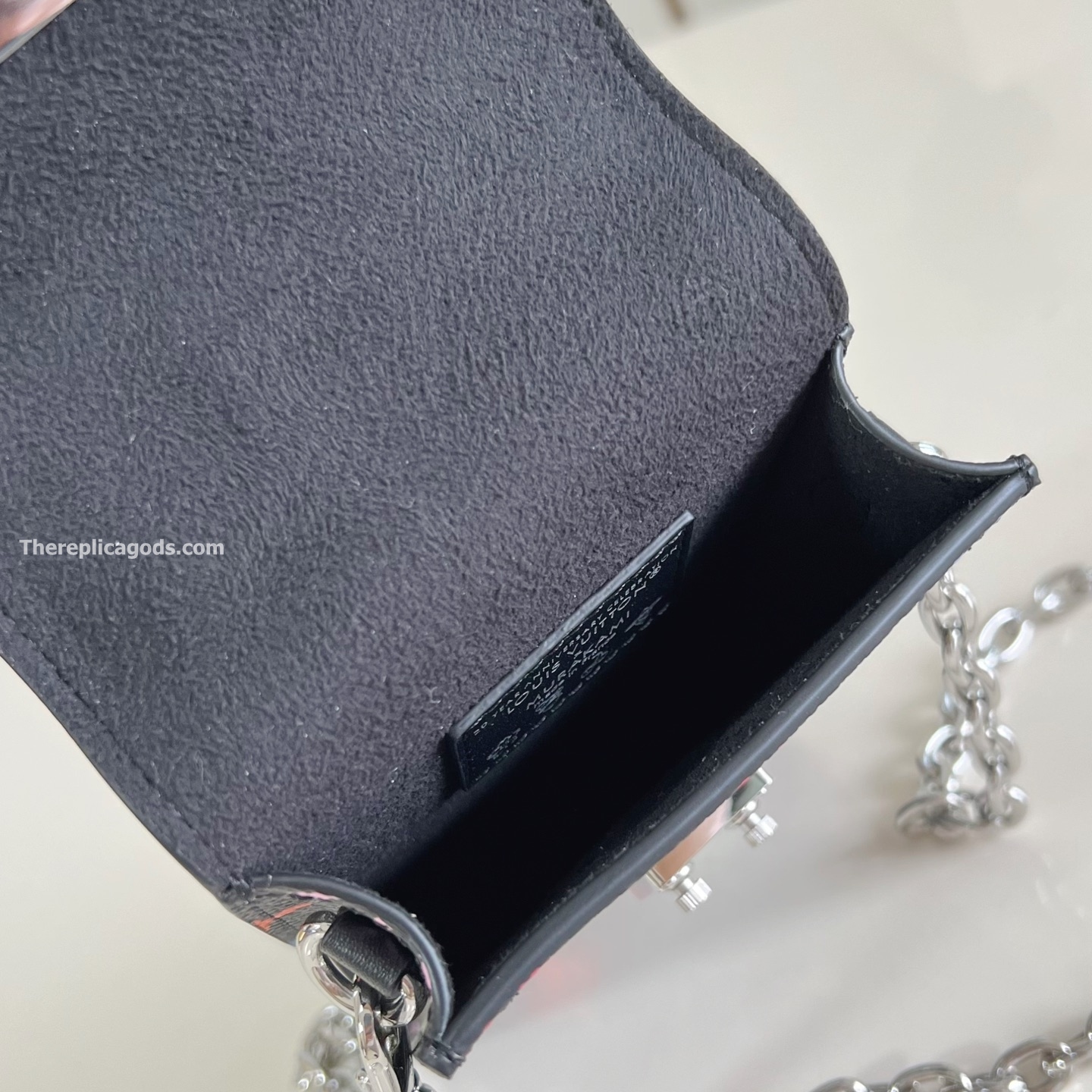 LV x TM PHONE POUCH METIS MULTICOLORED M14098