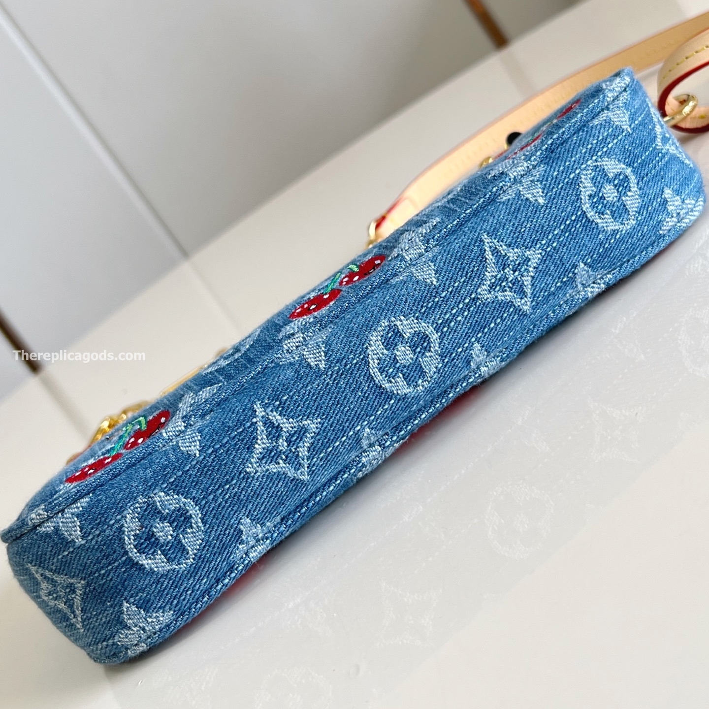 X TM POCHETTE ACCESSOIRES MONOGRAM CHERRY DENIM M13994