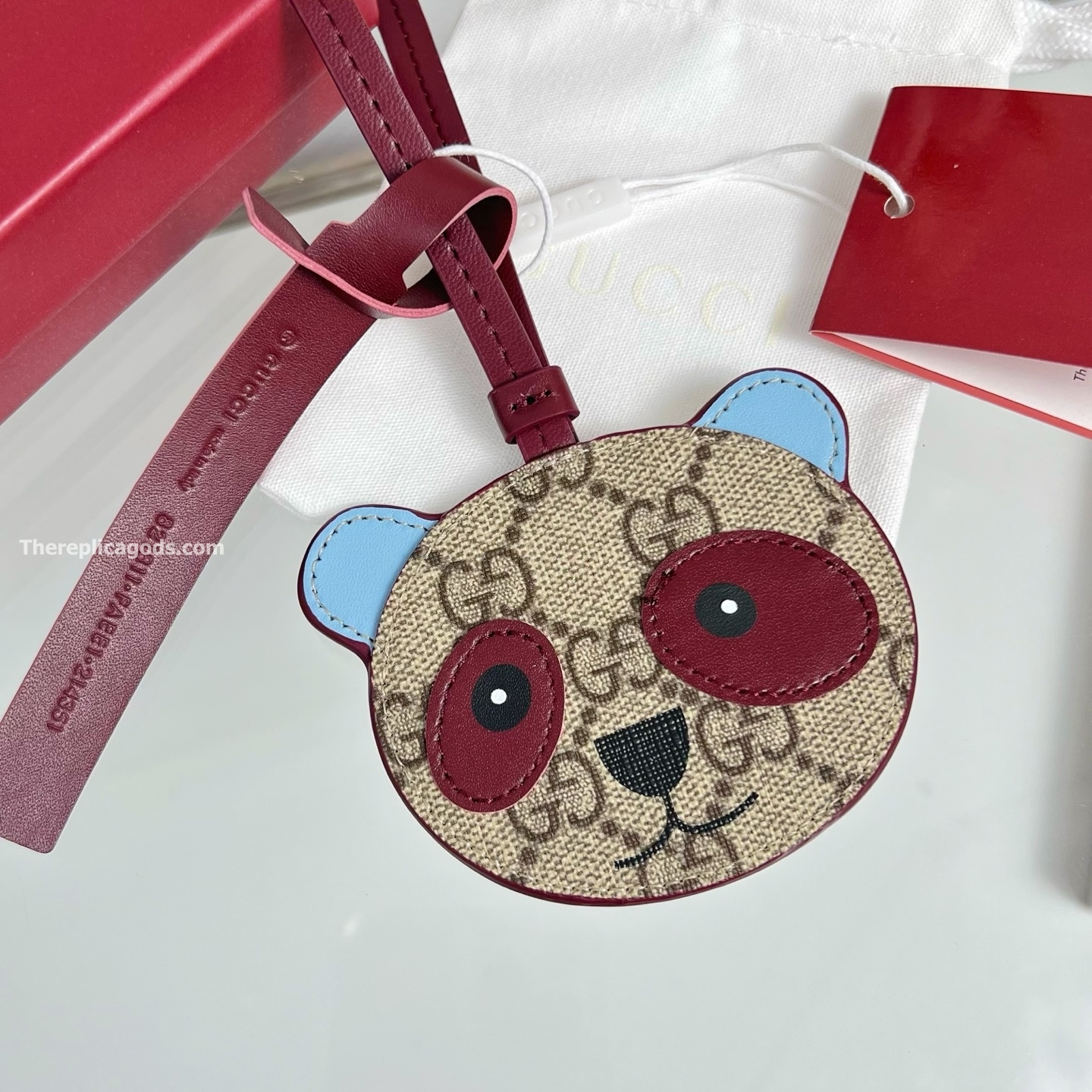 PANDA-SHAPED BAG CHARM BEIGE AND DARK BROWN NEW GG MONOGRAM CANVAS