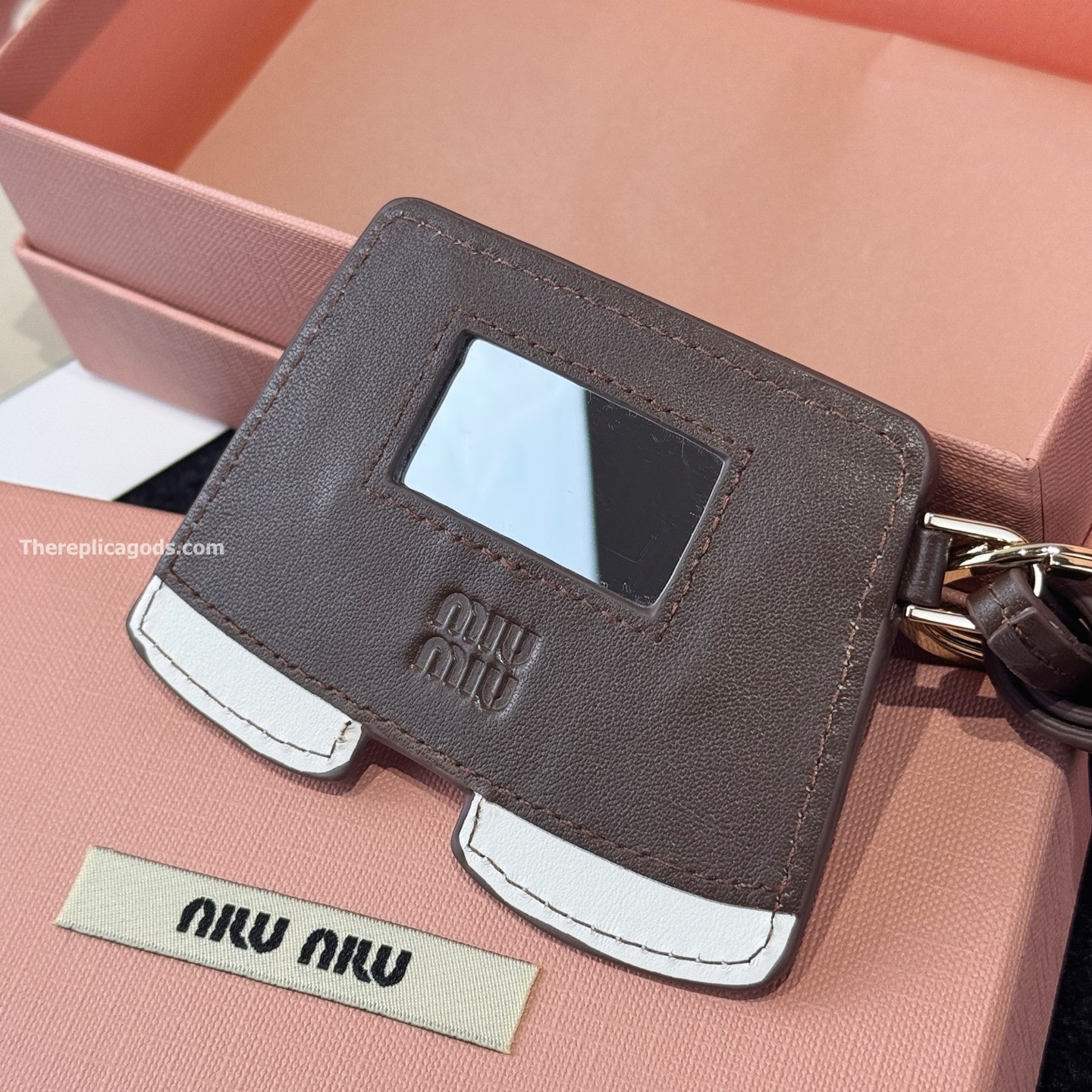 LEATHER KEYCHAIN TRICK IN BEIGE