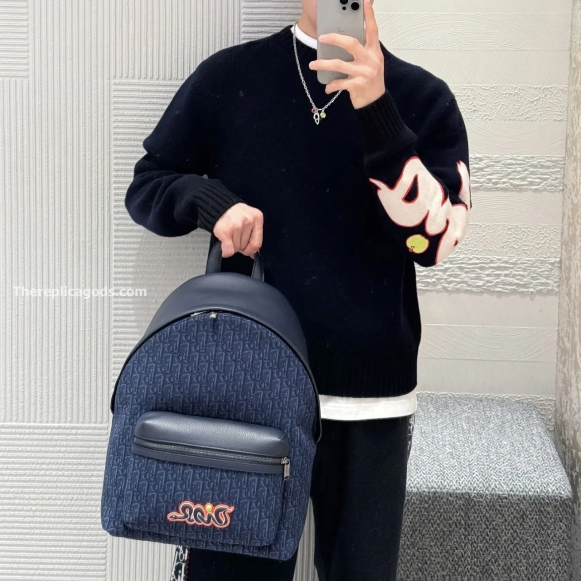 AND KAWS RIDER 2.0 ZIPPED BACKPACK NAVY BLUE GRAINED CALFSKIN AND OBLIQUE JACQUARD