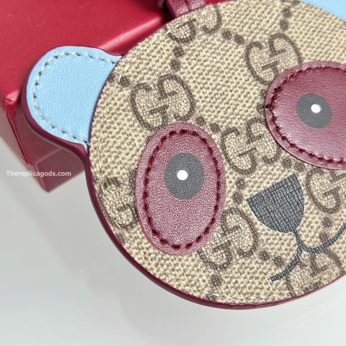 PANDA-SHAPED BAG CHARM BEIGE AND DARK BROWN NEW GG MONOGRAM CANVAS