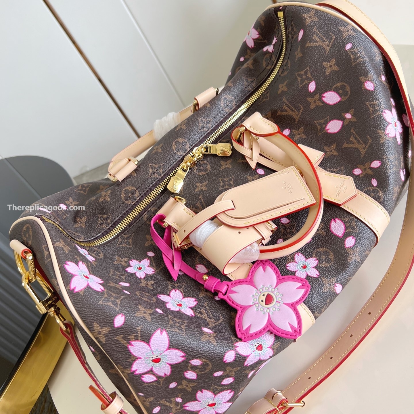 LV x TM KEEPALL BANDOULIERE 45 SAKURA BROWN M13752